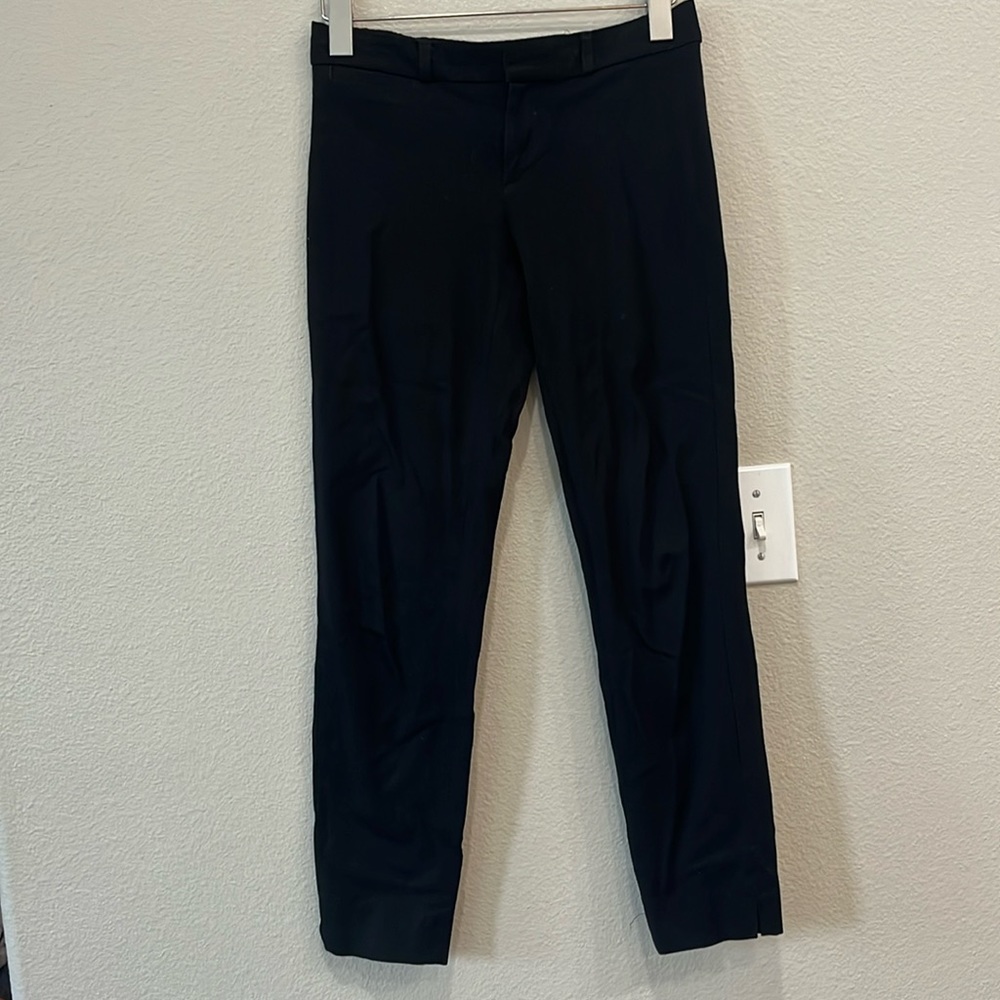 Banana Republic Sloan women’s black work pant. Size 0 can fit 00.